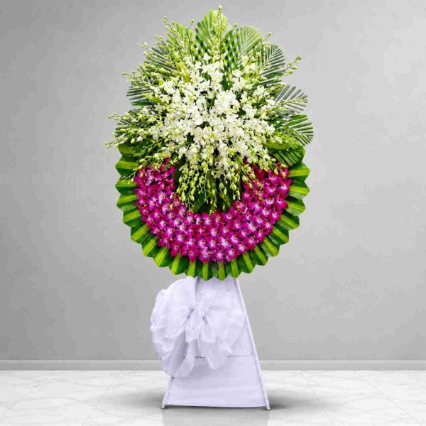 Kệ hoa chia buồn 034 với lan trắng phối lan tím hồng nổi bật, thiết kế trang trọng và tinh tế