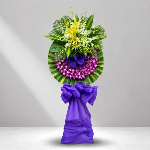 Kệ hoa chia buồn 123 tông tím sang trọng kết hợp hoa lan và ly vàng