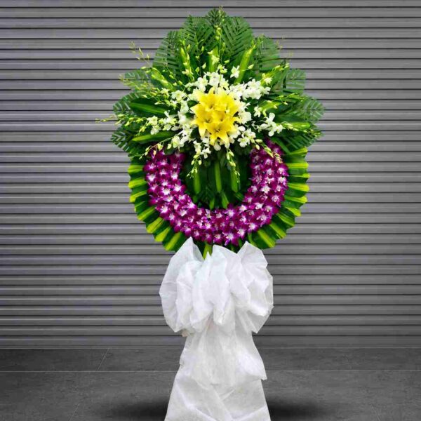 Kệ hoa chia buồn 124 tông tím vàng sang trọng gửi lời phân ưu sâu sắc
