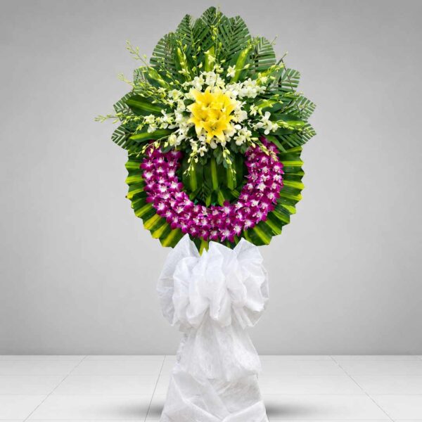 Kệ hoa chia buồn 124 tông tím vàng sang trọng gửi lời phân ưu sâu sắc