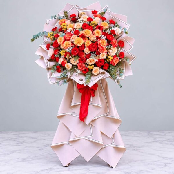 Lẵng hoa hồng đỏ cam Rạng Rỡ Thành Công trang trí khai trương sang trọng