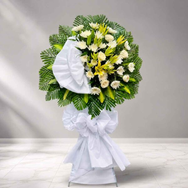 Kệ hoa chia buồn 428 hoa trắng phối ly vàng sang trọng và trang nghiêm